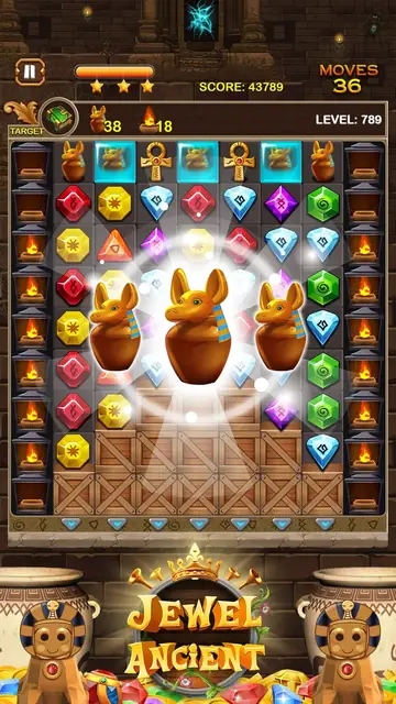 Schermata di gioco di Jewel Ancient con lo schema di gemme e il logo del titolo